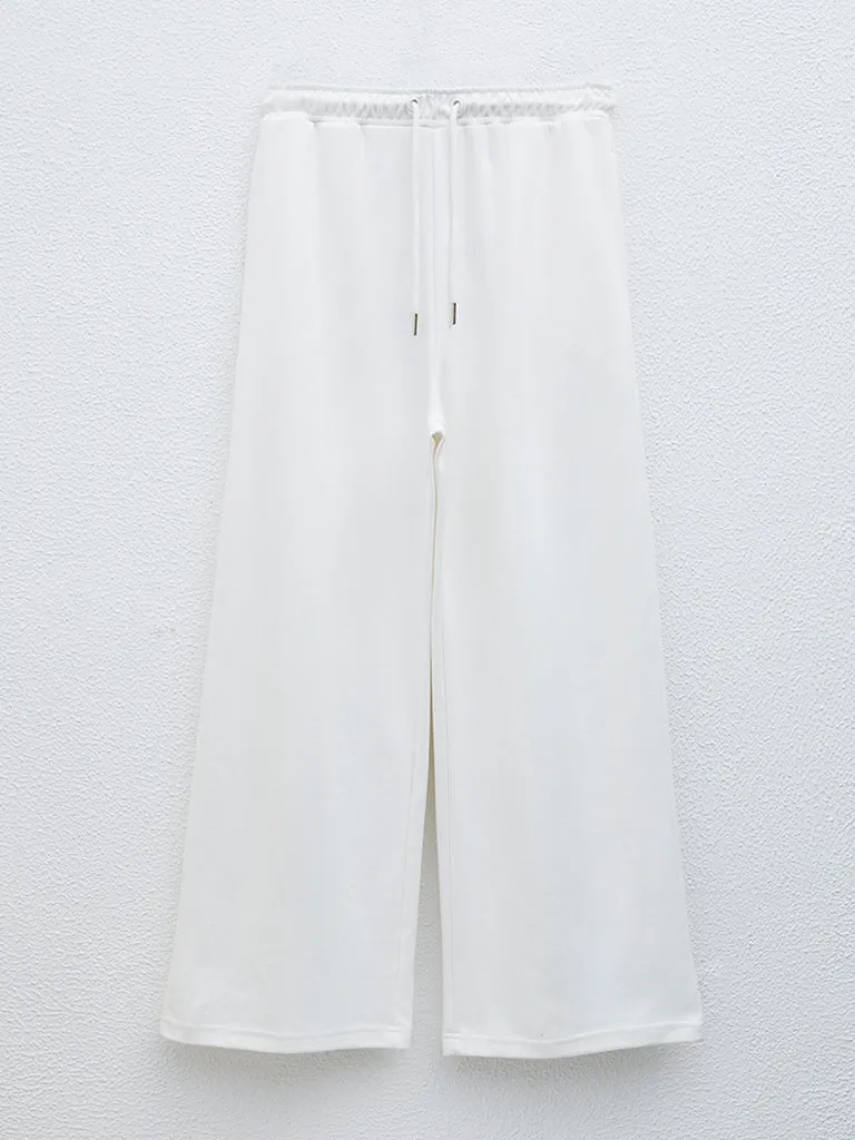 LOV Off-White Solid High-Rise Track Pants